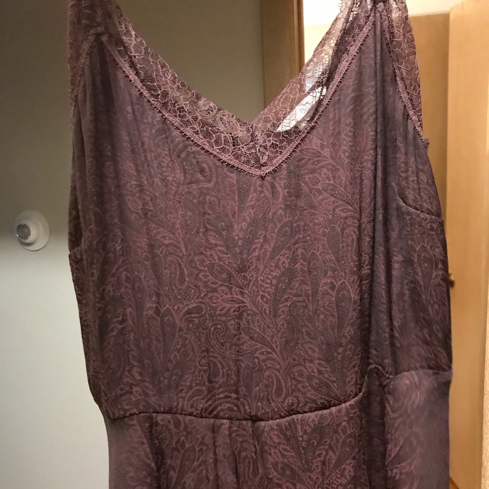 H&M silk purple top with floral details.